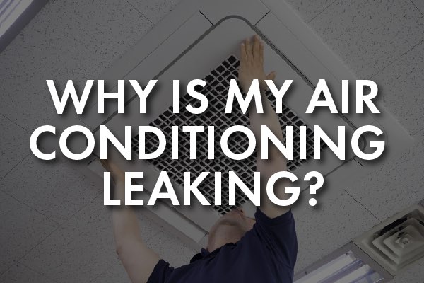 A person checking an air conditioner with the words, "why is my air conditioning leaking?"